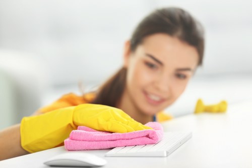 Kitchen surfaces being wiped during house cleaning
